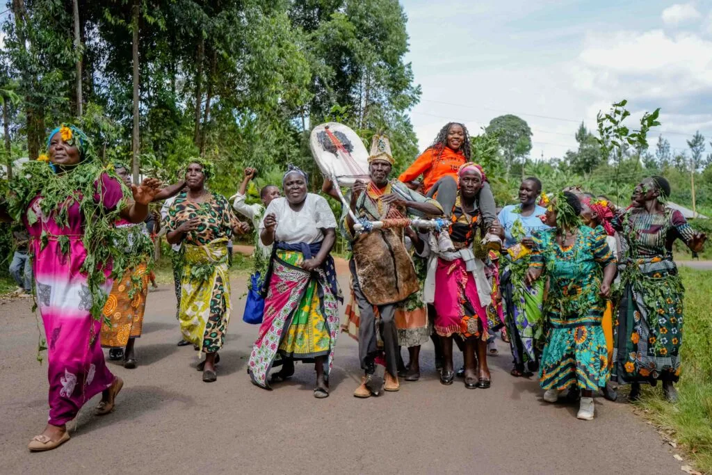 Welcome Party. Margaret Nyamumbo, founder of Kahawa 1893 is welcomed in celebrations by women in her community in Kisii, Kenya. Photo by Billy Miaron Welcome Party. Margaret Nyamumbo, founder of Kahawa 1893 is welcomed in celebrations by women in her community in Kisii, Kenya. Photo by Billy Miaron